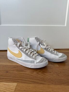 Nike Mid-Top Sneakers with Yellow Swoosh and Gray Accents